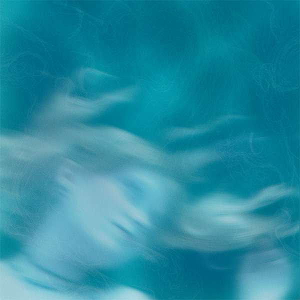 Catharsis album cover, with blurred person floating underwater